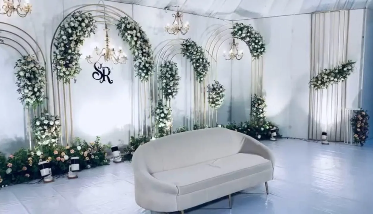 Blue Drape Stage with Flower Cascades